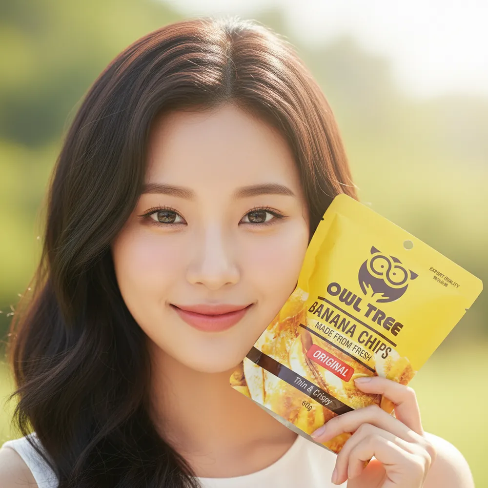 Smiling woman holding a pack of OWLTREE Banana Chips